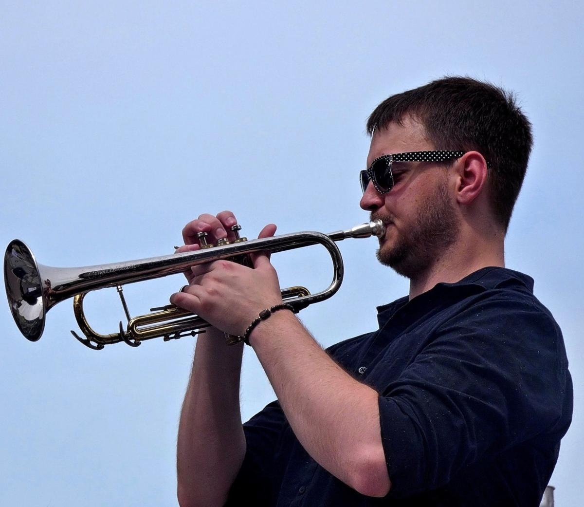 Jacob Wisenbach playing trumpet