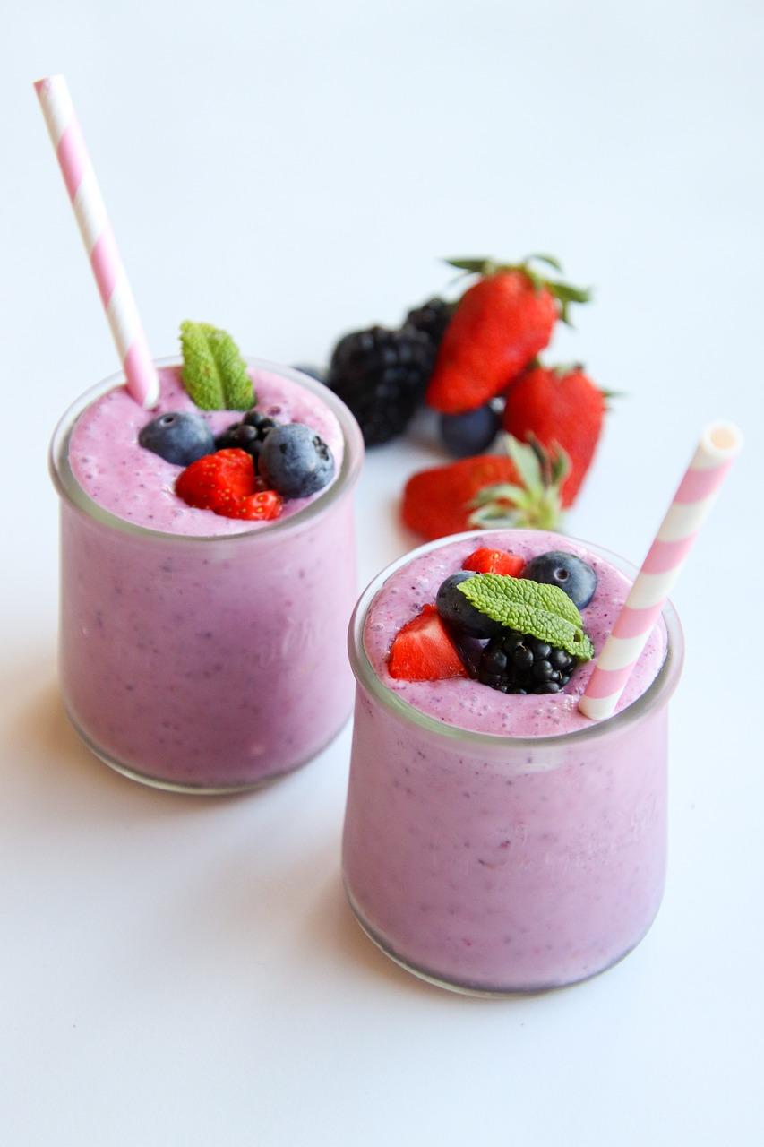 Picture of fruit smoothies in glass jars.